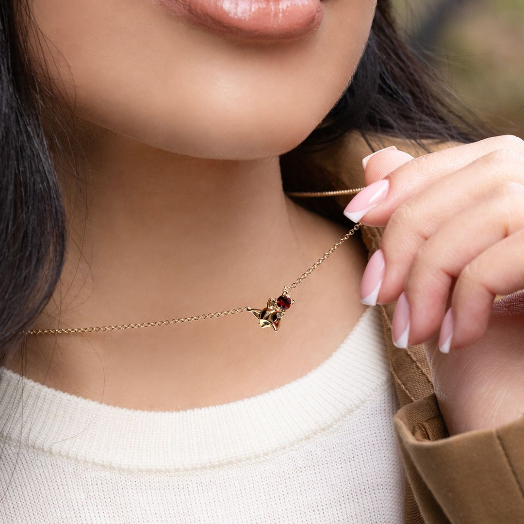 How do you clean a birthstone necklace without damaging it?