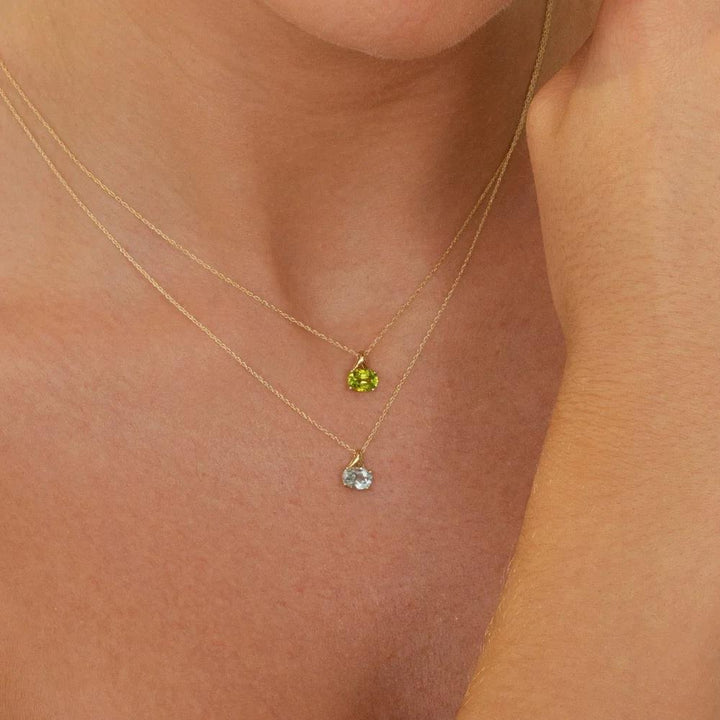 Classic Oval Sky Blue Topaz Pendant Necklace in 9ct Yellow Gold 7x5mm