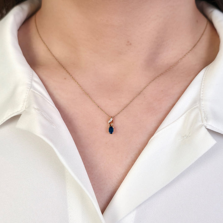 Classic Oval Emerald & Diamond Twist Pendant in 9ct Yellow Gold