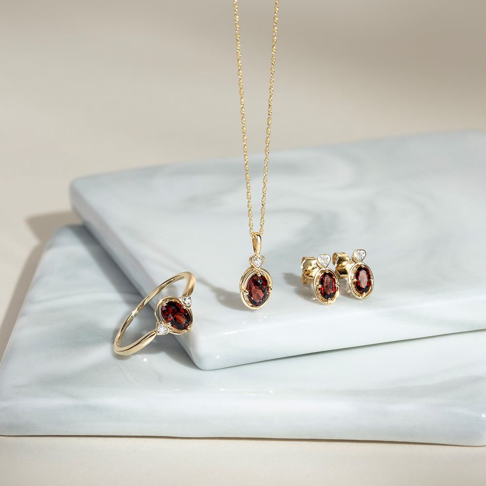 classic-oval-garnet-diamond-heart-pendant-necklace-in-9ct-yellow-gold-135p2142049 Flatlay