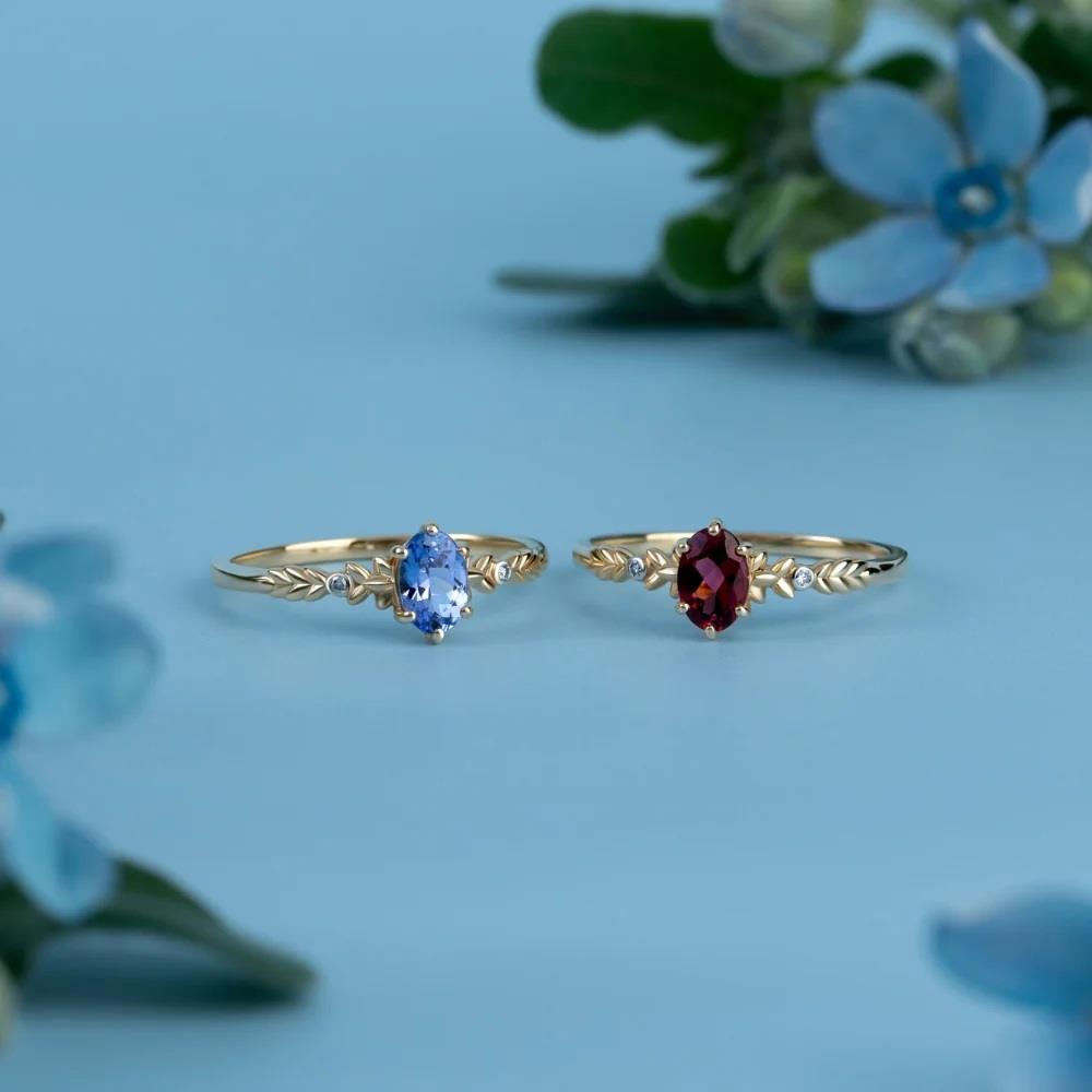 Classic Oval Tanzanite & Diamond Ring in 9ct Yellow Gold