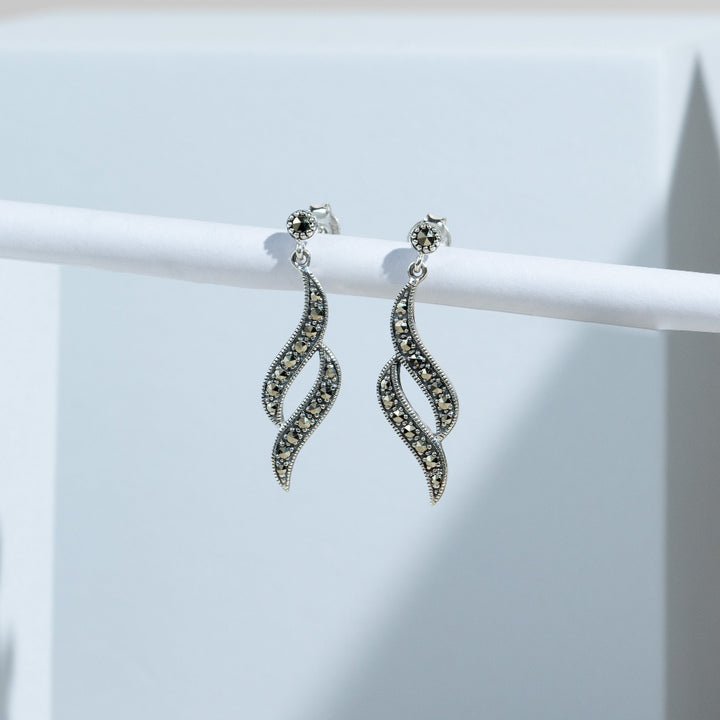 Art Nouveau Style Round Marcasite Swirl Drop Earrings in 925 Sterling Silver flatlay