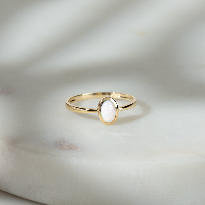 Classic Oval Opal Ring in 9ct Yellow Gold