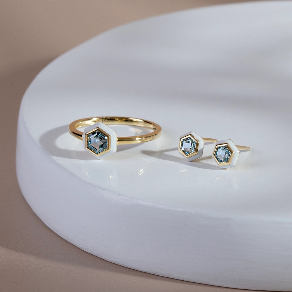 Geometric_hex_blue_topaz_and_white_enamel_ring_and_stud_earrings_in_gold_plated_sterling_silver