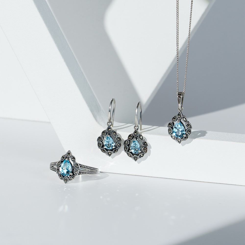 Art Deco Style Pear Blue Topaz & Marcasite Ring in Sterling Silver