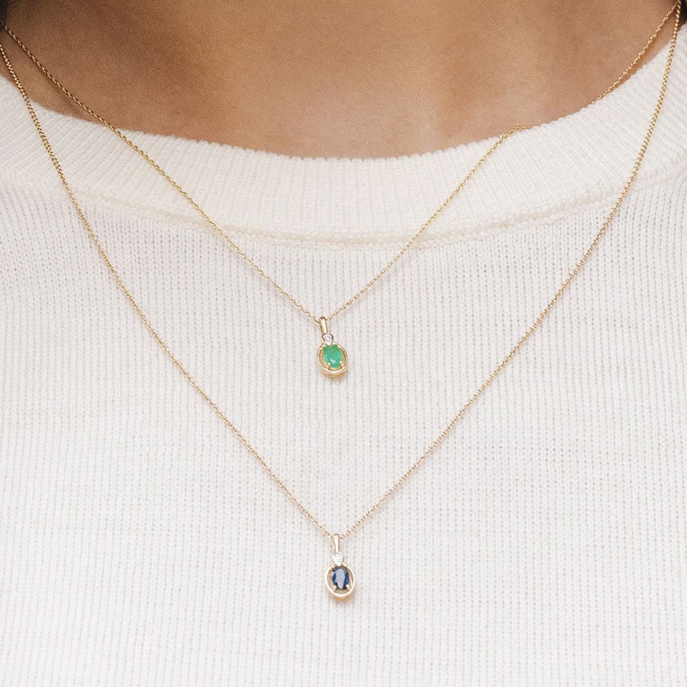 Classic Oval Emerald & Round Diamond Pendant Necklace In 9ct Yellow Gold
