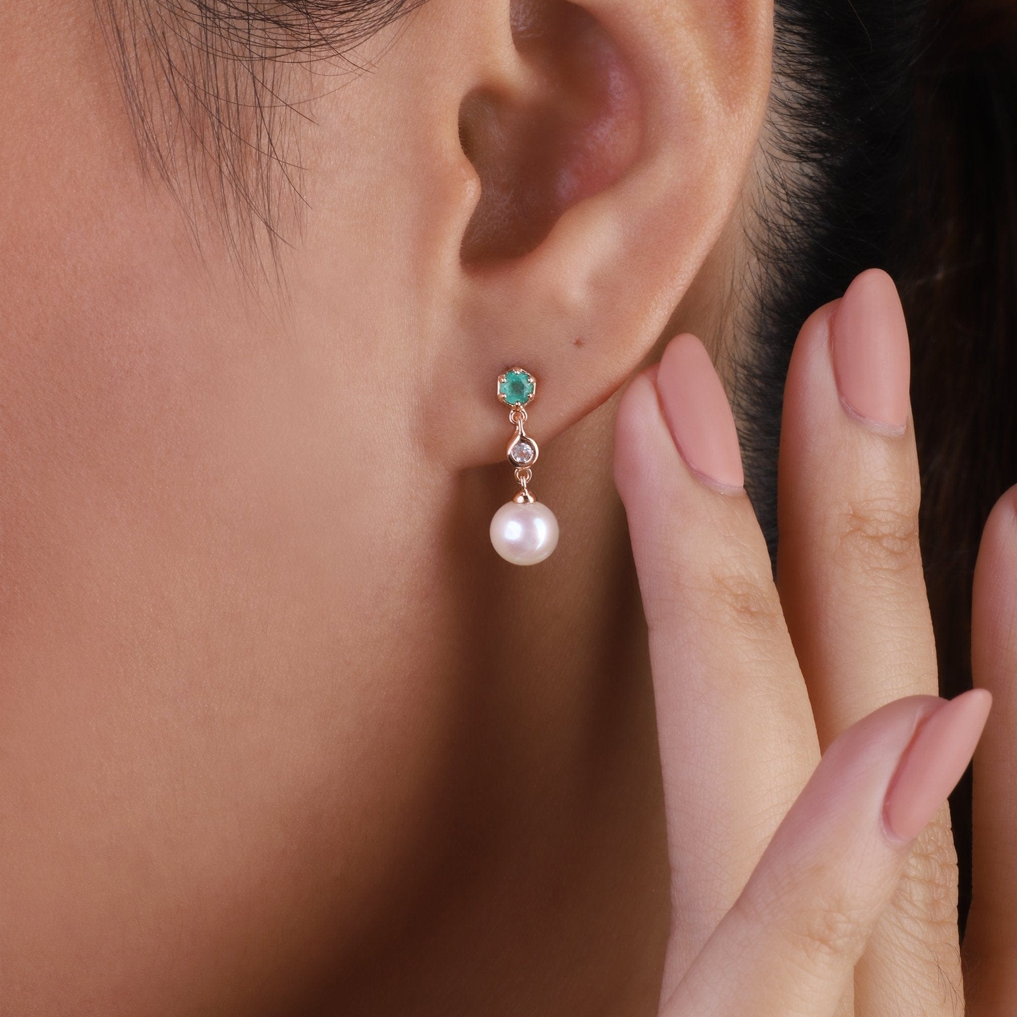 Modern Pearl, Emerald & Topaz Mismatched Drop Earrings in Rose Gold Plated Sterling Silver on model