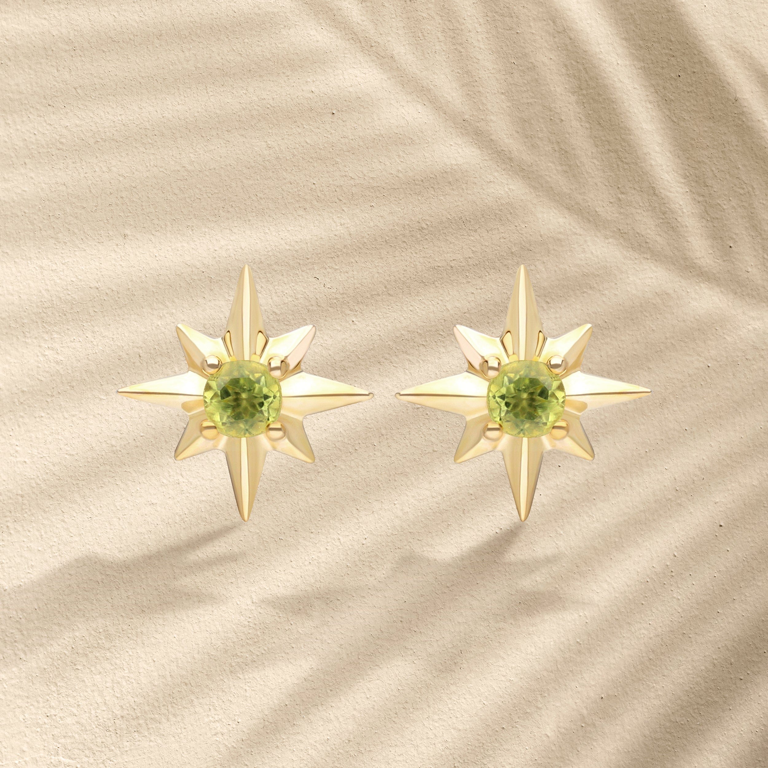 135E1821049 Night Sky Peridot Star Stud Earrings in 9ct Yellow Gold On Model